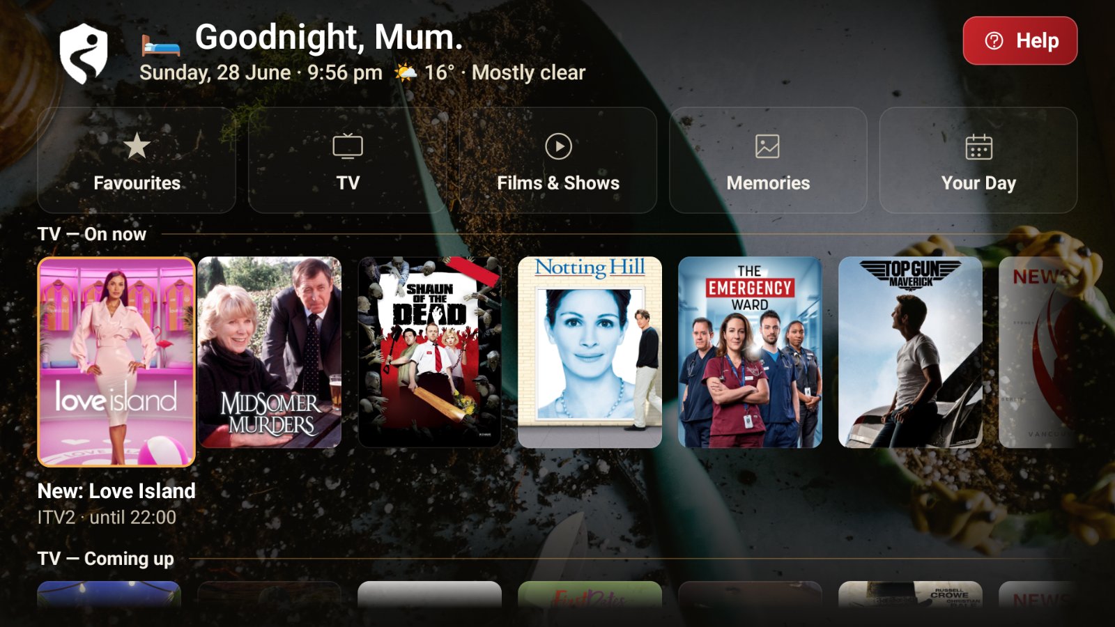The Mary TV home screen with a calm evening greeting, TV, films, memories and a HELP button